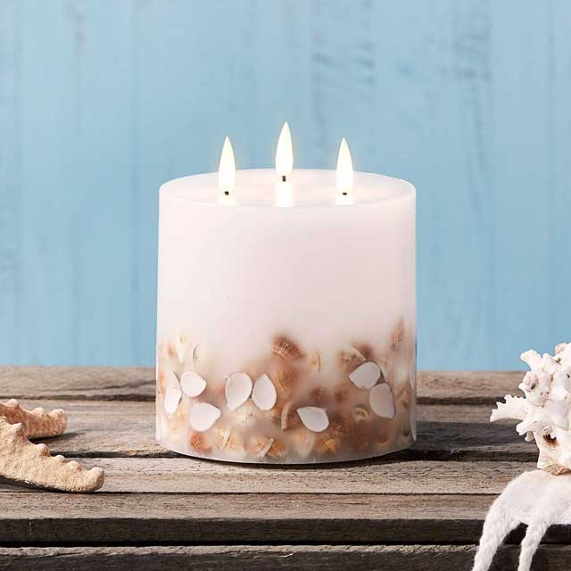 Lights4fun TruGlow® Ivory Wax Pillar Candle – 3 Wick LED, Shell Decorated, Battery Operated Indoor Warm White Candle