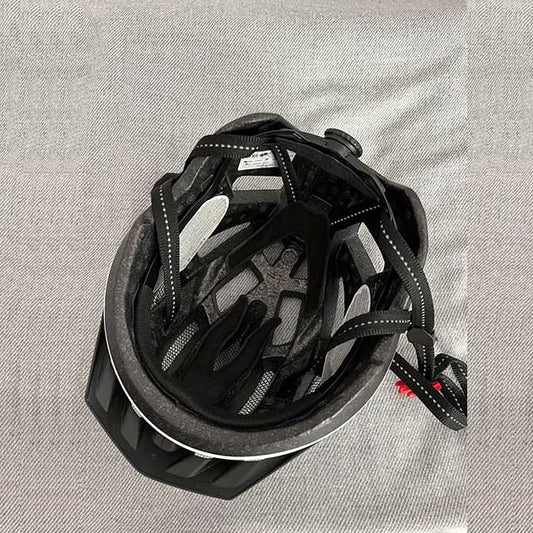 Bicycle helmet with removable rear light