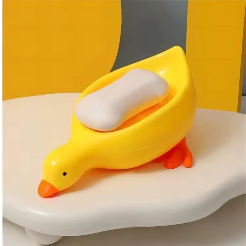 Porte-savon créatif en forme de canard à drainage automatique – Joli porte-savon animal pour salle de bain et cuisine – Porte-savon de douche décoratif antidérapant – Support de lavabo amusant pour enfants et décoration d'intérieur (jaune / blanc)