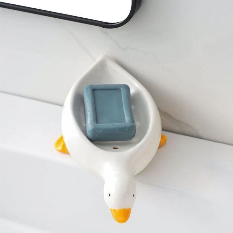 Porte-savon créatif en forme de canard à drainage automatique – Joli porte-savon animal pour salle de bain et cuisine – Porte-savon de douche décoratif antidérapant – Support de lavabo amusant pour enfants et décoration d'intérieur (jaune / blanc)
