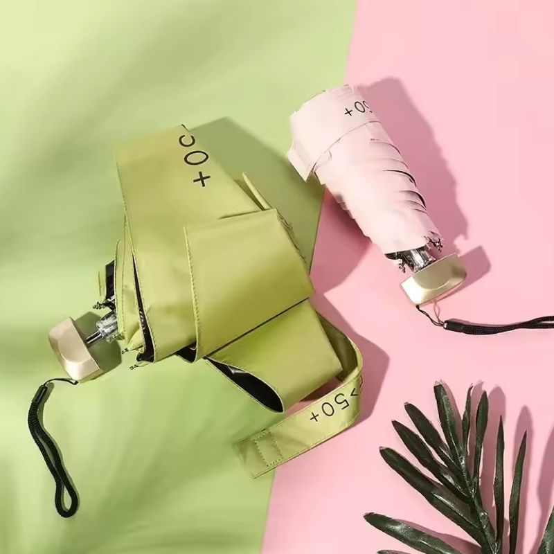Mini parapluie de poche capsule – Pare-soleil pliable en vinyle avec protection UV UPF 50+ – Parapluie compact ultra-léger pour la pluie et le soleil