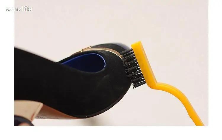 Brosse de nettoyage pour plaque de cuisson