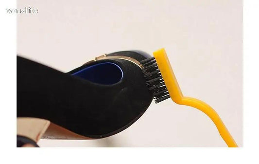 Brosse de nettoyage pour plaque de cuisson