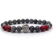 Bracelet en forme de tête de lion avec perles grises et rouges