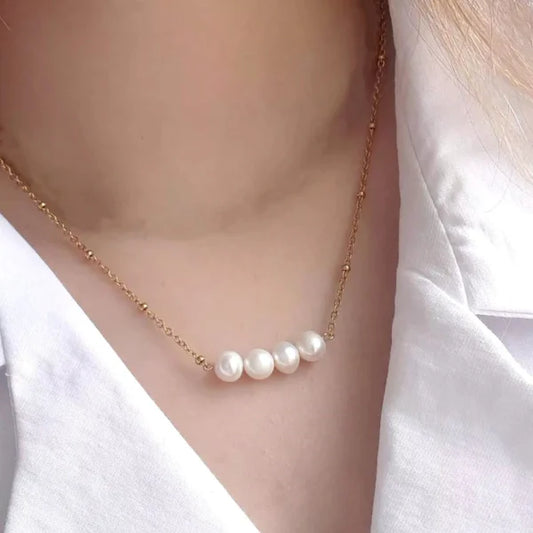 قلادة نسائية مصنوعة يدويًا من الفولاذ المقاوم للصدأ بسلسلة من اللؤلؤ (EGN217)