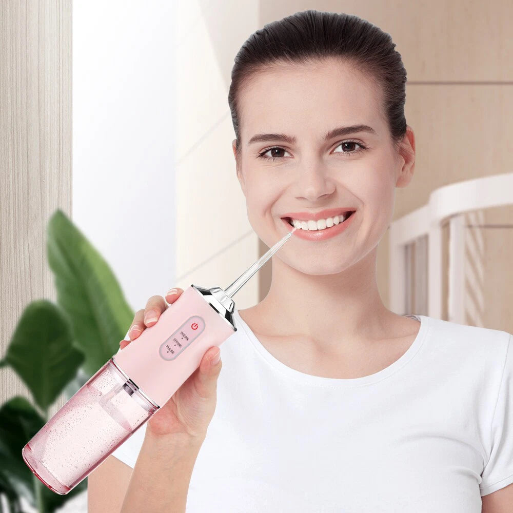 Portable Smart Electric Water Flosser – Rechargeable Oral Irrigator with 3 Deep-Clean Modes & 4 Interchangeable Jet Tips – IPX7 Waterproof Dental Water Jet Teeth Cleaner (White / Pink / Green)